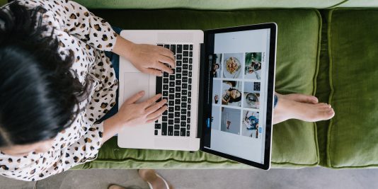 woman working on laptop computer