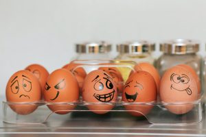 eggs with faces drawn on them